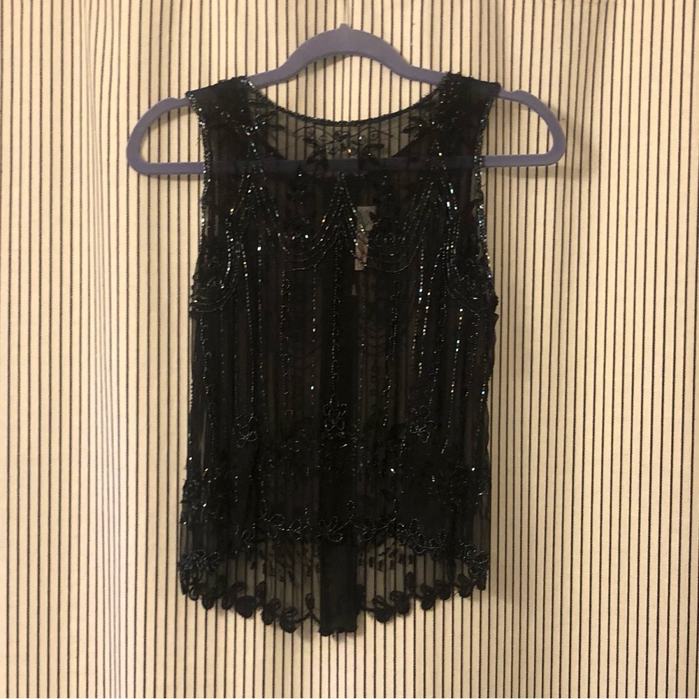Black Sequin Sleeveless silk top with back zipper.